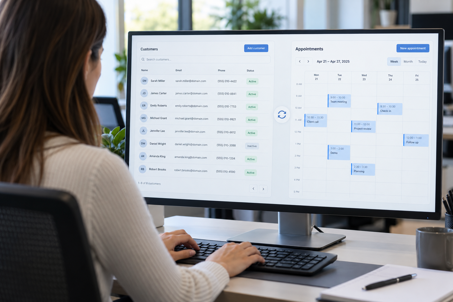 Specialist reviewing connected customer records and appointment scheduling